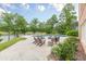 An inviting pool area with comfortable lounge seating offers the perfect backyard oasis by the lake at 3718 Lake Vis, Douglasville, GA 30135