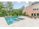 Backyard pool with integrated spa and a travertine patio featuring lounge seating at 3718 Lake Vis, Douglasville, GA 30135