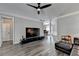 Stylish open-concept living room and living area offering modern comfort and design at 595 Stonepark Ln, Suwanee, GA 30024