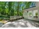 Spacious deck with built-in seating overlooking the lush, green backyard at 893 Vistavia Cir, Decatur, GA 30033