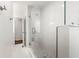 Bathroom featuring a glass shower with marble tile and mosaic floor at 893 Vistavia Cir, Decatur, GA 30033