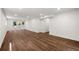 Open floor plan with hardwood floors and sliding glass doors to outdoor area at 893 Vistavia Cir, Decatur, GA 30033