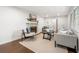 Cozy living room with hardwood floors, fireplace, and comfortable seating arrangement at 893 Vistavia Cir, Decatur, GA 30033