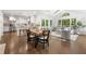 Open concept living space with modern kitchen, dining area, and living room with ample natural light at 893 Vistavia Cir, Decatur, GA 30033