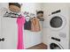 Convenient laundry room with stacked washer/dryer and ample storage at 989 Bibbs Circle Nw # 25, Atlanta, GA 30318