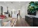 Spacious open concept living space, connecting modern kitchen and living room areas at 989 Bibbs Circle Nw # 25, Atlanta, GA 30318