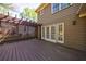 A wooden deck with a lattice-covered pergola offers a charming outdoor space off the rear exterior at 1021 Oakpointe Pl, Dunwoody, GA 30338