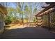 Wide angle of the wooden deck with lattice-covered pergola at 1021 Oakpointe Pl, Dunwoody, GA 30338