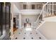 Grand foyer featuring tile floors, a staircase, and a view of the upper level at 1021 Oakpointe Pl, Dunwoody, GA 30338