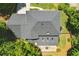 Aerial view of roof and backyard featuring a patio with an outdoor seating area at 1850 Linnet Ne Ct, Roswell, GA 30075