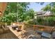 Spacious wooden back deck with seating, perfect for outdoor entertaining overlooking the lush backyard at 1850 Linnet Ne Ct, Roswell, GA 30075