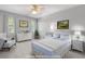 Bright bedroom with white furnishings, plush carpet, and soft blue accents at 1850 Linnet Ne Ct, Roswell, GA 30075