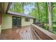 View of a private wooden deck, overlooking wooded backyard at 2174 Kinridge Rd, Marietta, GA 30062
