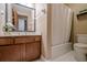 Traditional bathroom featuring vanity with granite counters, and tub/shower with tiled surround at 2174 Kinridge Rd, Marietta, GA 30062