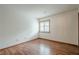 Sunlit bedroom with wood floors and a window offering ample natural light at 2174 Kinridge Rd, Marietta, GA 30062