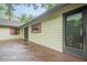 Rear of the house with wood deck and access to house and backyard at 2174 Kinridge Rd, Marietta, GA 30062