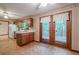 Kitchen features French doors that lead to a wooden deck and backyard at 2174 Kinridge Rd, Marietta, GA 30062