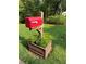 Attractive mailbox and flower planter add curb appeal to this charming home at 2174 Kinridge Rd, Marietta, GA 30062