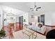 Bright living room with hardwood floors, a vaulted ceiling and contemporary decor creates a welcoming atmosphere at 3020 River Oak Mews, Decatur, GA 30034