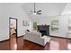 Bright living room with vaulted ceiling, hardwood floors, a fireplace, and neutral decor at 3020 River Oak Mews, Decatur, GA 30034