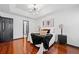 Bedroom featuring hardwood floors, natural light, and a modern ceiling fan at 3020 River Oak Mews, Decatur, GA 30034