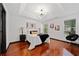Charming bedroom with hardwood floors, abundant natural light, and decor at 3020 River Oak Mews, Decatur, GA 30034