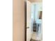Charming bathroom featuring a pedestal sink, mirror, and natural light from the window at 401 Mount Tabor Church Rd, Dallas, GA 30157