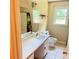 Bathroom featuring a shower-tub combo, tile flooring, and a vanity with a large mirror at 401 Mount Tabor Church Rd, Dallas, GA 30157