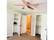 Spacious bedroom with ceiling fan and closet, offering comfort and functionality at 401 Mount Tabor Church Rd, Dallas, GA 30157
