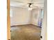 Cozy bedroom with a ceiling fan, carpet flooring, and natural light from the windows at 401 Mount Tabor Church Rd, Dallas, GA 30157