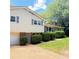 Charming home with brick accents, lush greenery, and well-maintained lawn at 401 Mount Tabor Church Rd, Dallas, GA 30157