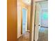 Hallway featuring neutral walls, with rooms leading to the bedrooms at 401 Mount Tabor Church Rd, Dallas, GA 30157