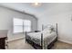 Comfortable bedroom with neutral carpet and a window with blinds at 555 Lance View Ln, Lawrenceville, GA 30045