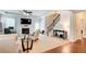 Spacious living room featuring a fireplace, ceiling fan, and staircase at 555 Lance View Ln, Lawrenceville, GA 30045