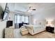 Bright main bedroom featuring a tray ceiling and bedside lamps at 555 Lance View Ln, Lawrenceville, GA 30045