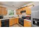 Functional kitchen with modern appliances and ample countertop space at 6540 Arbor Gate Sw Dr # 3, Mableton, GA 30126