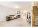 Spacious living room featuring a cozy fireplace and staircase at 6540 Arbor Gate Sw Dr # 3, Mableton, GA 30126