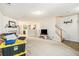 Open-concept living room with fireplace and staircase at 6540 Arbor Gate Sw Dr # 3, Mableton, GA 30126