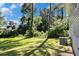 Expansive, lush backyard with mature trees, perfect for outdoor activities at 2641 Clifton Springs Rd, Decatur, GA 30034