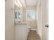 Bright bathroom with granite countertop and vinyl flooring at 2641 Clifton Springs Rd, Decatur, GA 30034