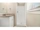 Bright bathroom featuring a walk-in shower and granite countertop at 2641 Clifton Springs Rd, Decatur, GA 30034