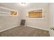 Cozy bedroom featuring carpet, neutral walls, and a window with blinds at 2641 Clifton Springs Rd, Decatur, GA 30034