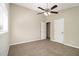 Inviting bedroom featuring soft carpet, ceiling fan, and lots of light at 2641 Clifton Springs Rd, Decatur, GA 30034
