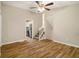 Bright living room with hardwood floors, stairs, and view to the kitchen at 2641 Clifton Springs Rd, Decatur, GA 30034