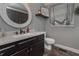 Stylish bathroom with modern fixtures and a decorative mirror at 9001 E Carroll Rd, Winston, GA 30187