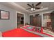 Cozy bedroom with wood-look tile flooring, trey ceilings, and neutral color palette at 9001 E Carroll Rd, Winston, GA 30187