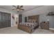 Comfortable bedroom with warm wood furniture and a calming gray palette at 9001 E Carroll Rd, Winston, GA 30187