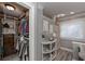 Well-organized walk-in closet with ample storage and natural light at 9001 E Carroll Rd, Winston, GA 30187