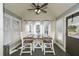 Charming dining area with vaulted ceilings and large windows for natural light at 9001 E Carroll Rd, Winston, GA 30187