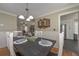 Inviting dining room with views into the living room and kitchen creates an easy flow and connection at 9001 E Carroll Rd, Winston, GA 30187